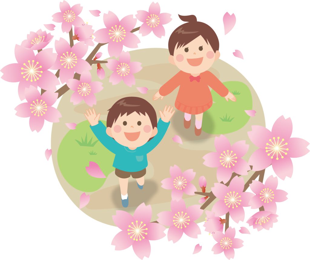 満開の桜の下で遊ぶ子供たち