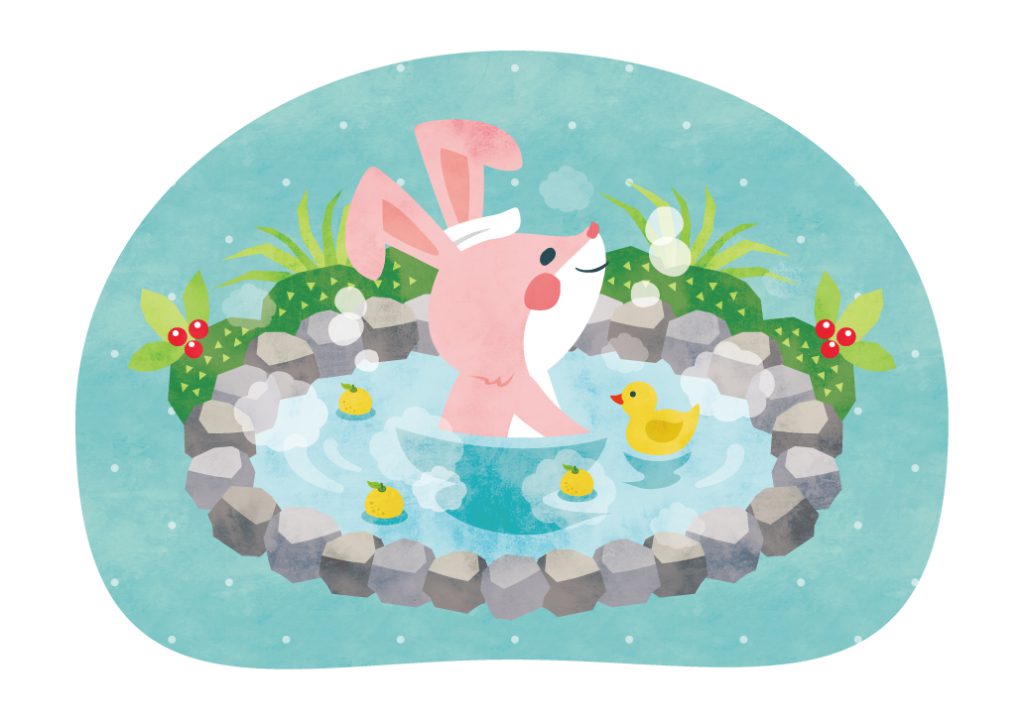 雪の降る日に天然温泉を楽しむウサギ